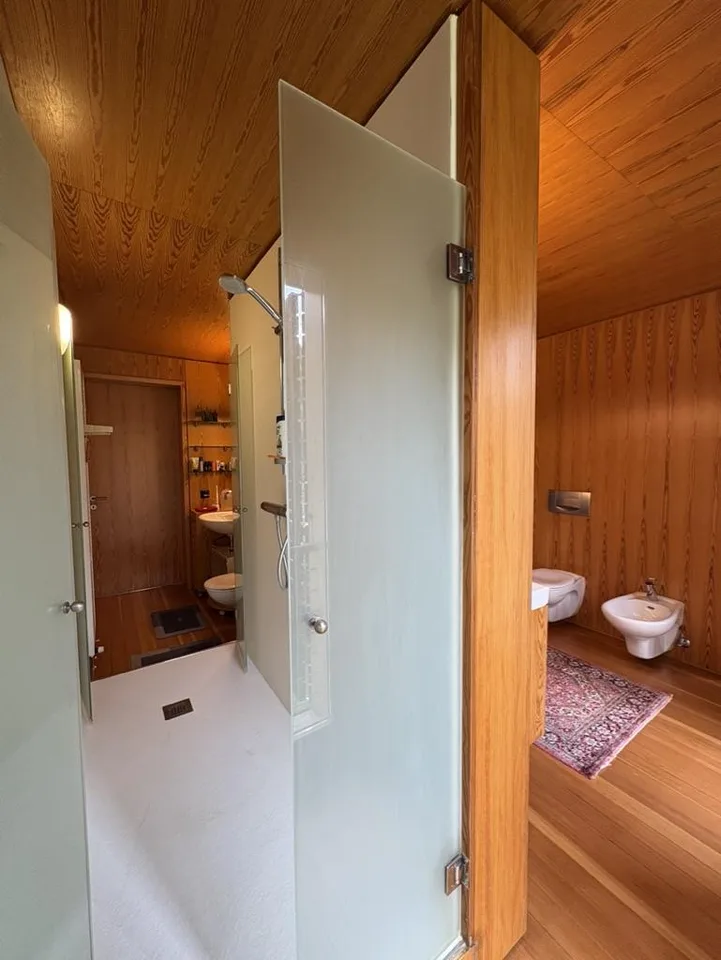 Casa di design in legno immersa nel verde – Foto 16 von 30