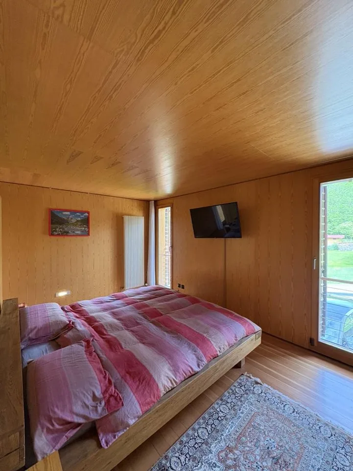 Casa di design in legno immersa nel verde – Foto 22 von 30