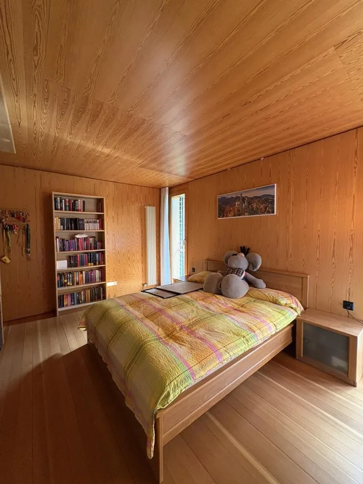 Casa di design in legno immersa nel verde – Foto 10 von 30