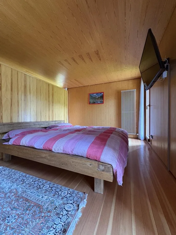 Casa di design in legno immersa nel verde – Foto 21 von 30