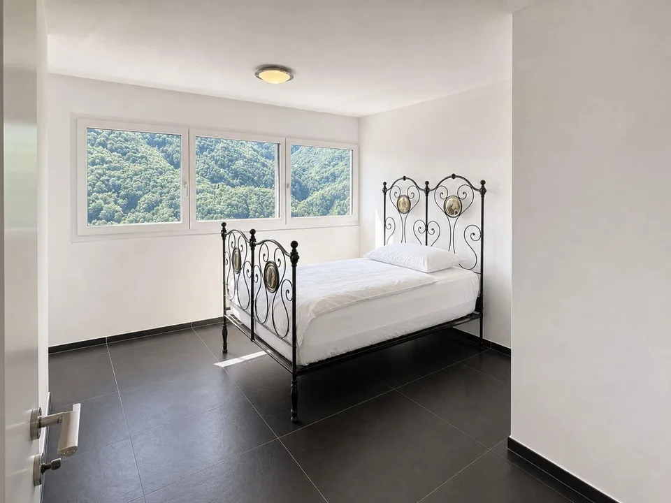 Casa plurifamiliare con grande potenziale e terreno edificabile inc... – Foto 10 von 13