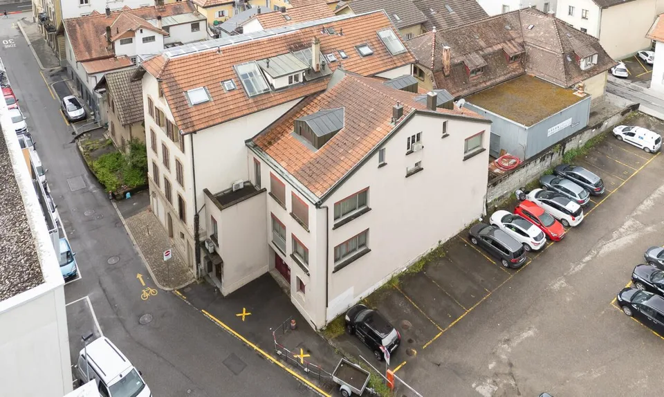 Immeuble mixte, emplacement stratégique au centre de Fribourg