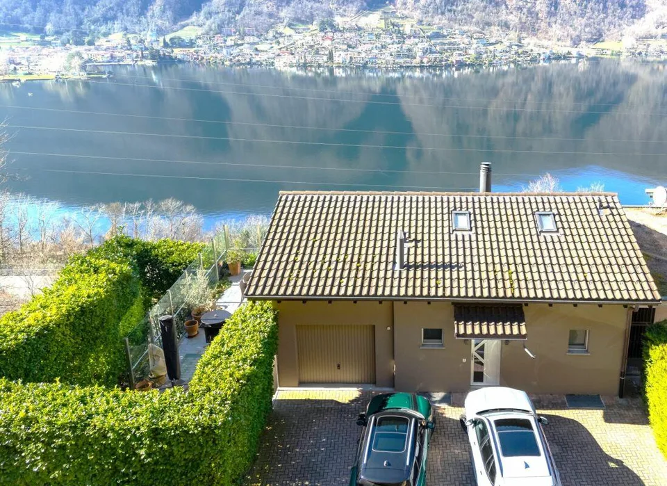 Esclusiva Casa immersa nella natura vista lago a 180°
