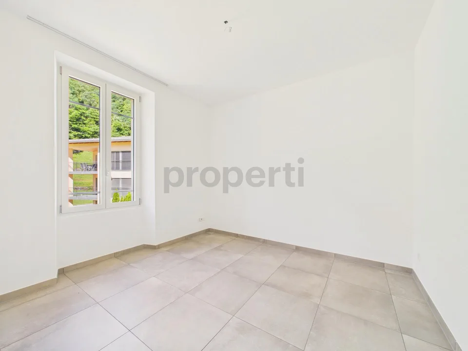 Elegante multiplex-house 10.5 locali con balcone, Acquarossa