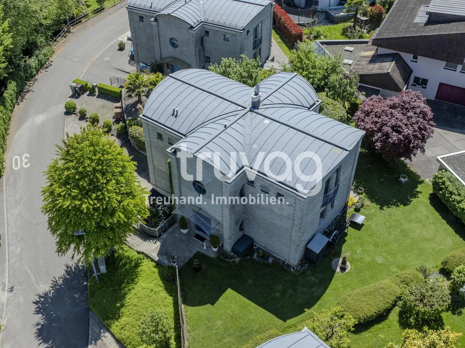 Freistehendes Einfamilienhaus mit Gartenoase