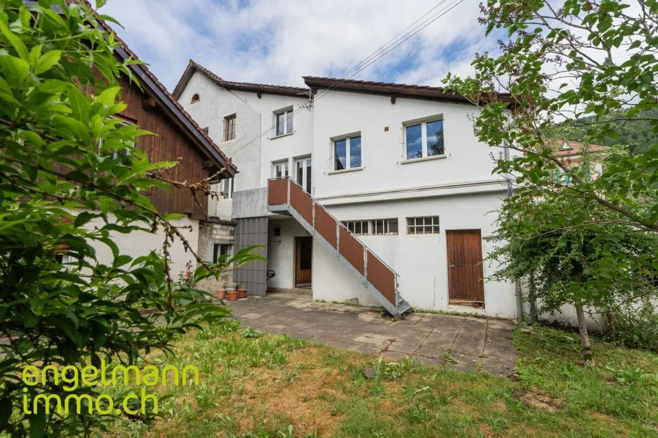 Immeuble de 2 appartements + surface commerciale / 2-Familienhaus m...
