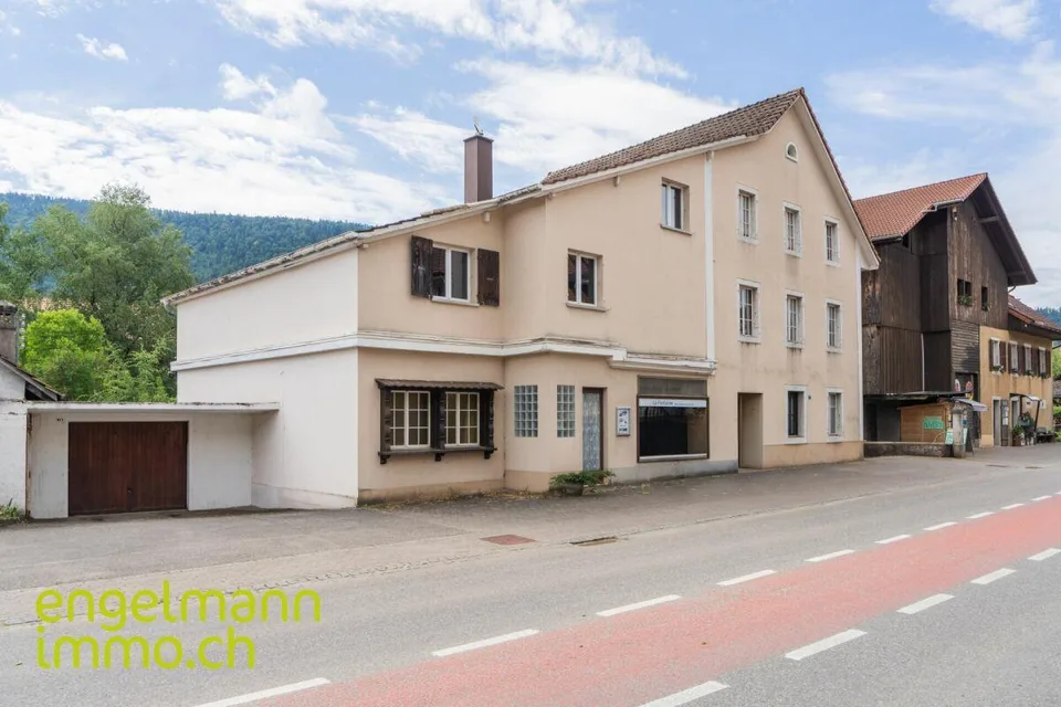 Immeuble de 2 appartements + surface commerciale / 2-Familienhaus m...