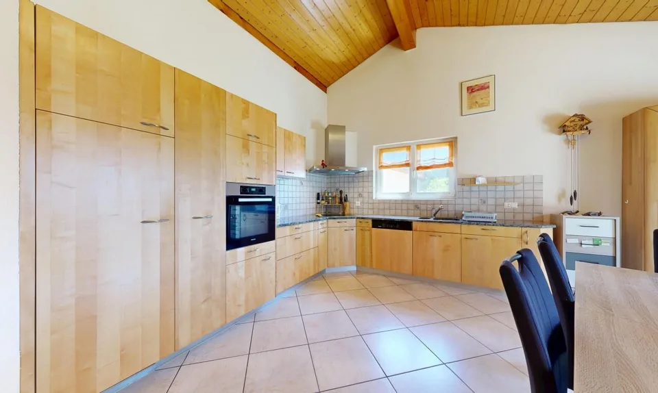 Bright single-storey villa with tree-lined garden in Onnens – photo 8 of 11