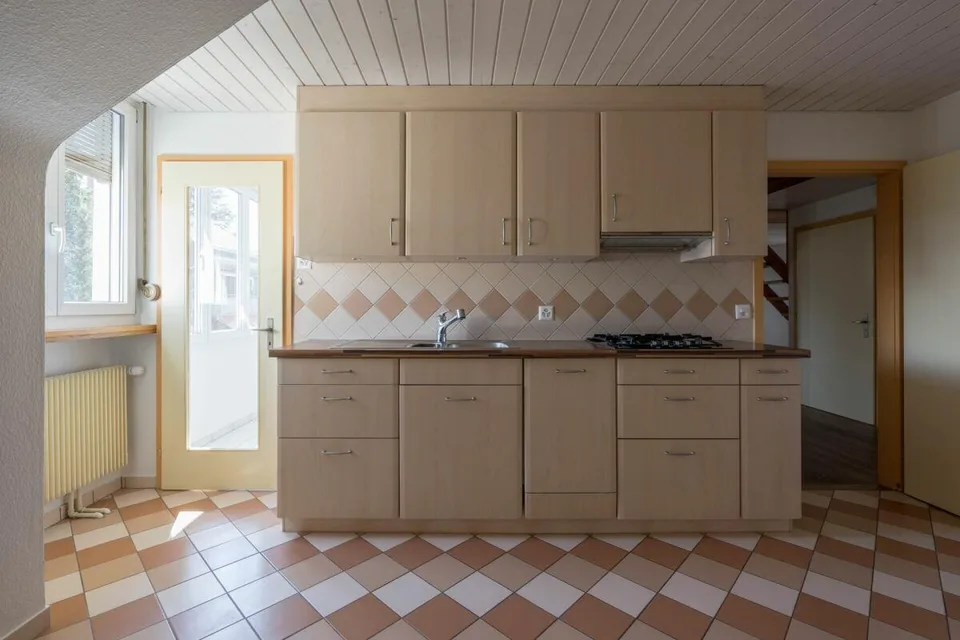 Vollvermietetes Mehrfamilienhaus mit 3 Wohnungen und 2 Garagen – foto 24 di 30