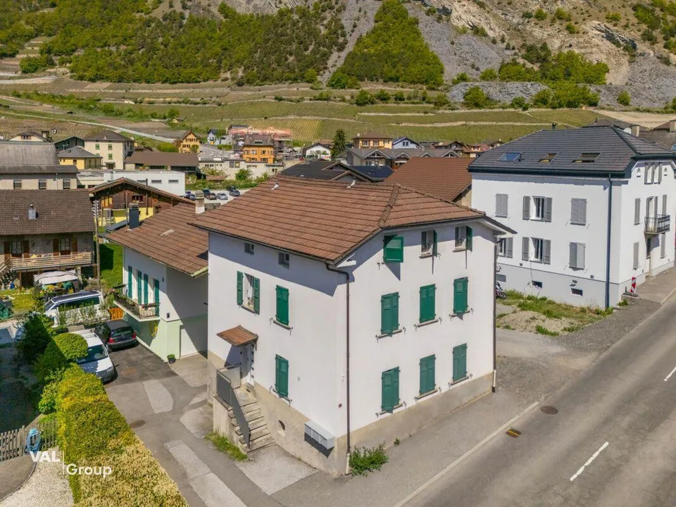 Petit immeuble au coeur du villlage avec rendement brut à 4.5%