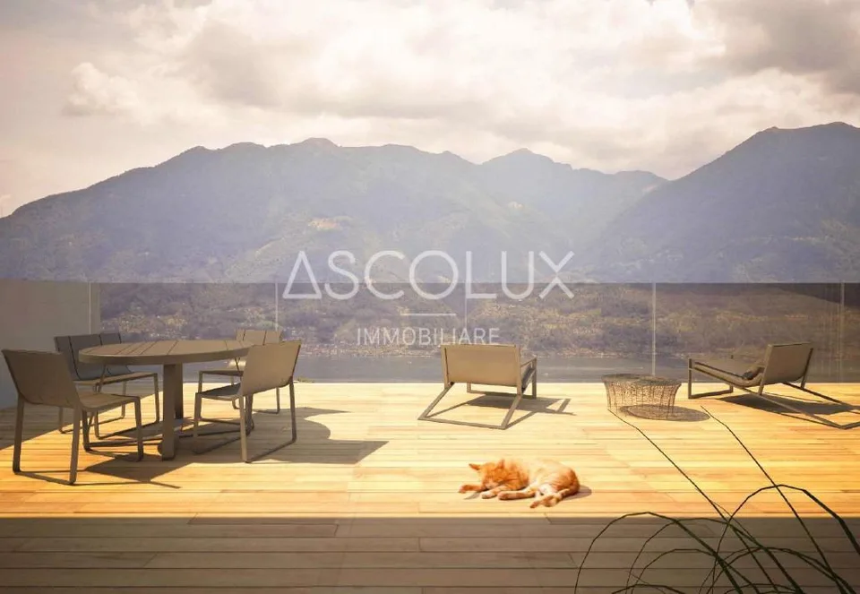Attico di Classe con Vista Lago – 3.5 Locali di Eleganza e Luce | D...