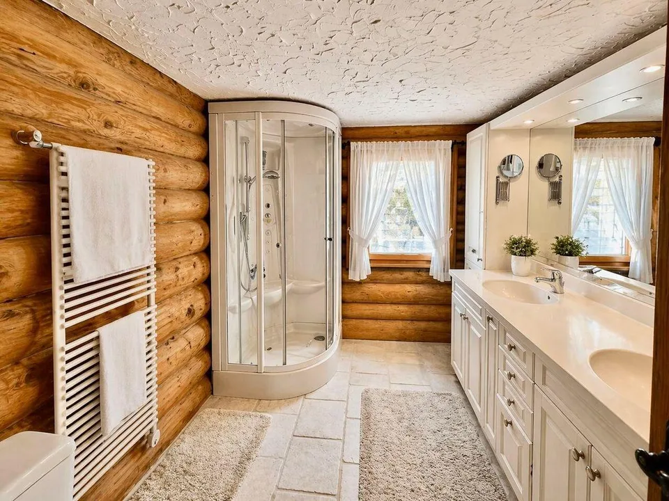 MAISON INDIVIDUELLE D'EXCEPTION EN RONDINS DE BOIS – photo 8 sur 13