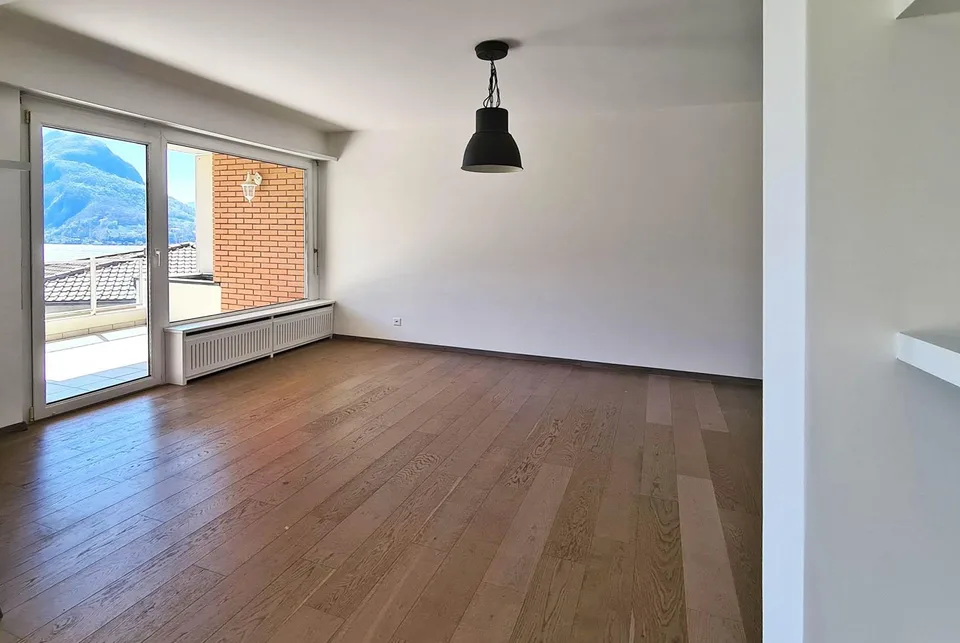AMPIO 3.5 CON VISTA LAGO MOZZAFIATO A LUGANO CASTAGNOLA