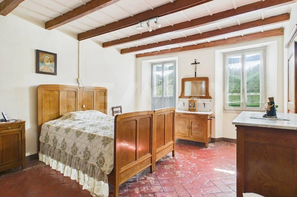 Casa da ristrutturare a Caneggio: ottima opportunità d'investimento – Foto 10 von 13