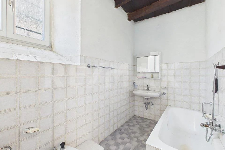 Casa da ristrutturare a Caneggio: ottima opportunità d'investimento – Foto 7 von 13