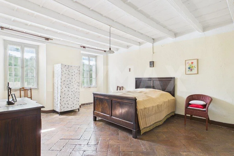 Casa da ristrutturare a Caneggio: ottima opportunità d'investimento – Foto 12 von 13