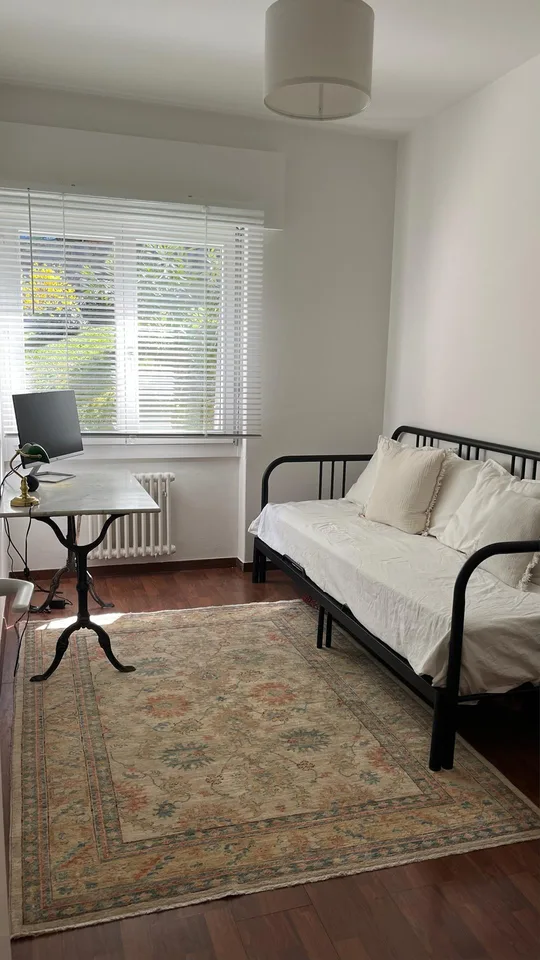 "Elegante appartamento 4.5 locali con giardino privato a Lugano"