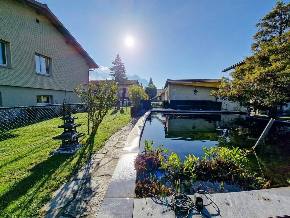 Dreamlike single-family house with winter garden, fish/swimming pond and large garden – photo 15 of 16