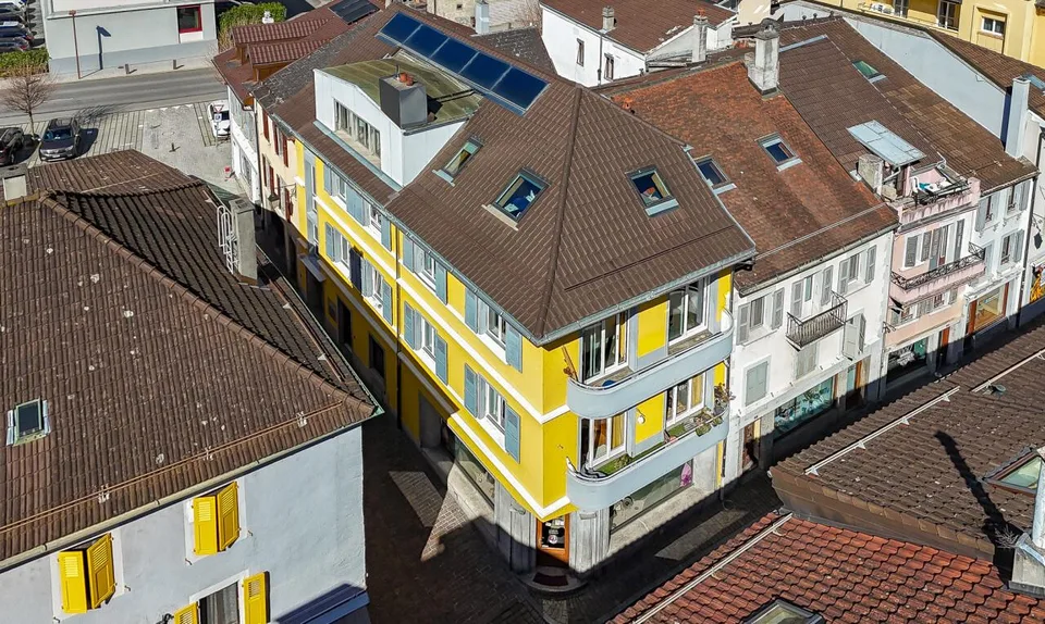 Immeuble mixte 2 Commerces + 3.5 + 8.5 en duplex