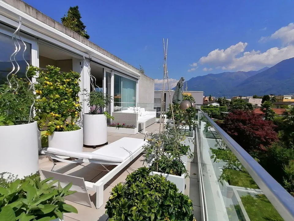 Attico di lusso di 4.5 locali con grande terrazza e 2 posteggi in a...