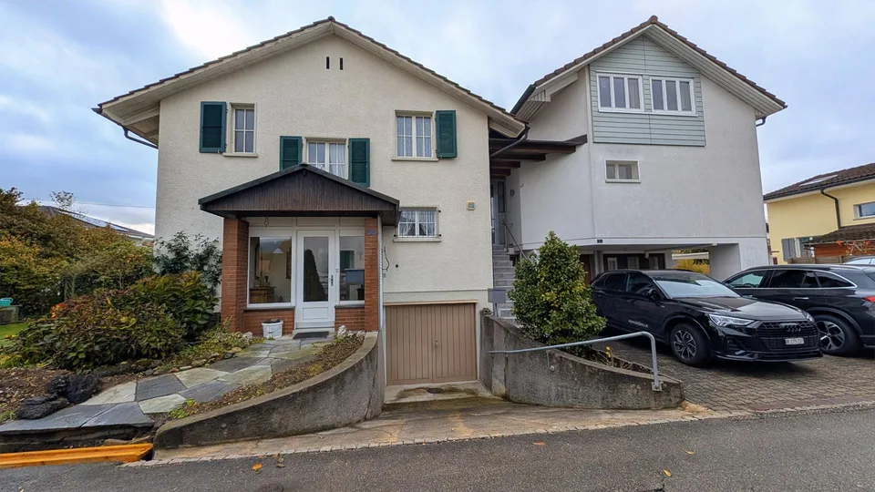 Bauland und Doppeleinfamilienhaus