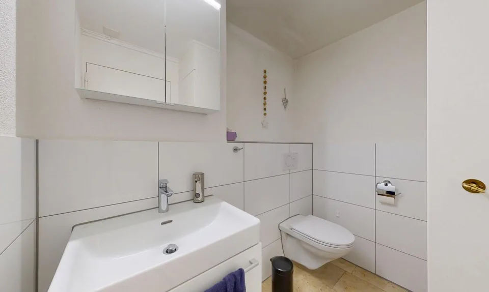 Attraente casa a schiera di 5,5 stanze con giardino a bassa manutenzione
