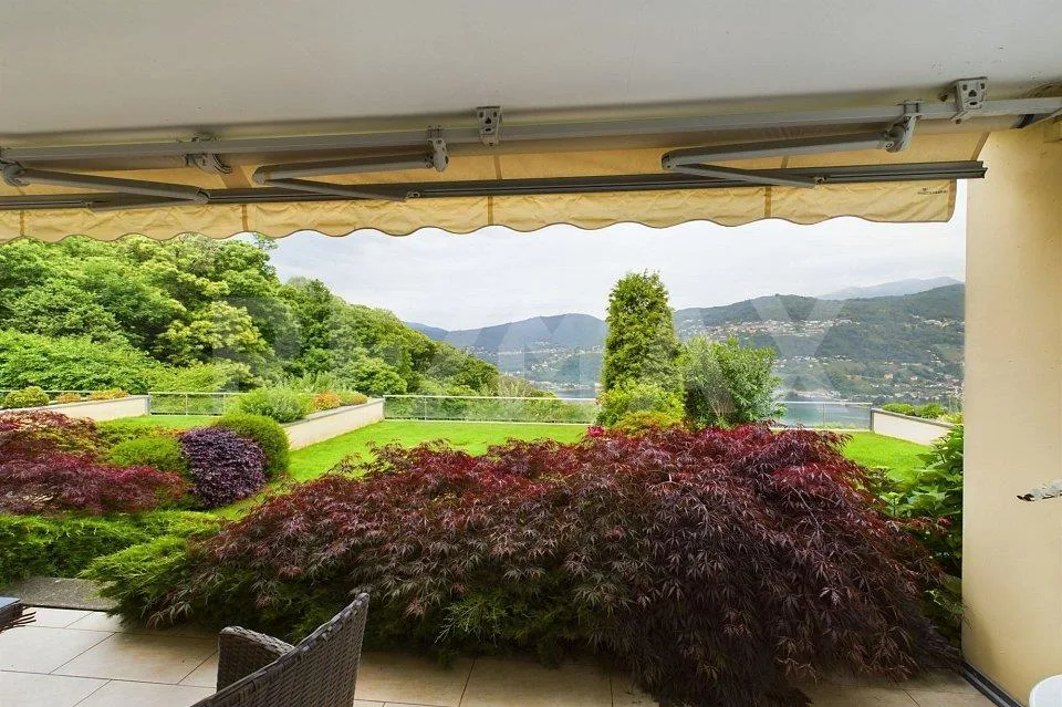 Appartamento di 4½ locali con vista da sogno e giardino privato