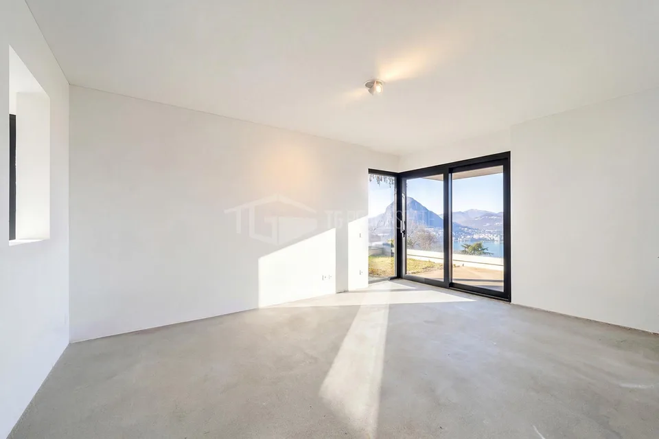 Nuovo spazioso appartamento 4,5 con vista lago e giardino