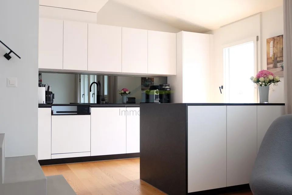 Appartement en duplex moderne et rénové au cœur de St. Johann