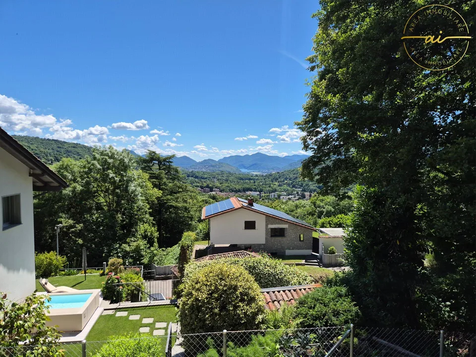 ESCLUSIVO 4.5 LOCALI CON GIARDINO E VISTA PANORAMICA
