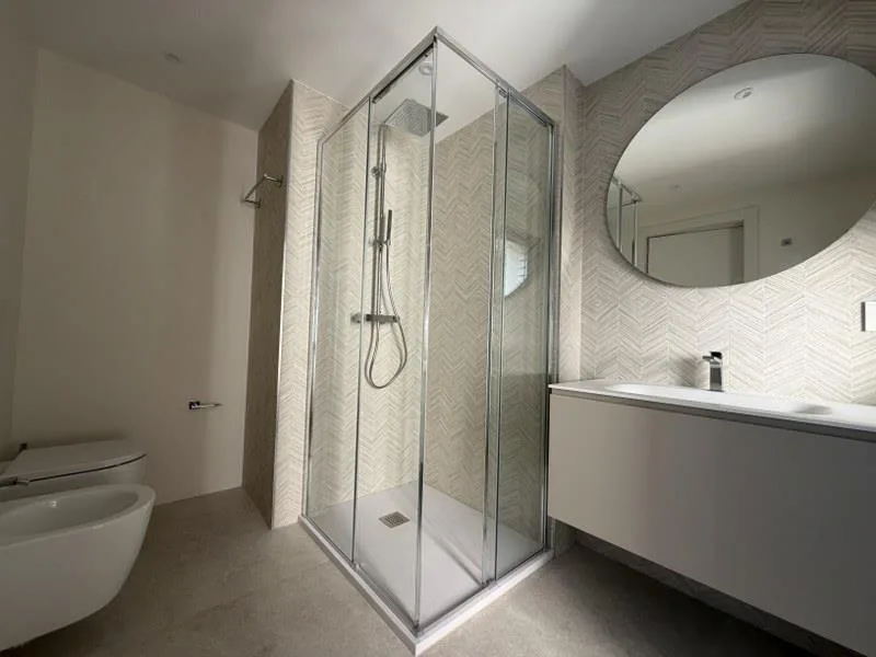 APPARTAMENTO 4.5 LOCALI CON GIARDINO AD USO ESCLUSIVO IN ELEGANTE P... – Foto 11 von 13