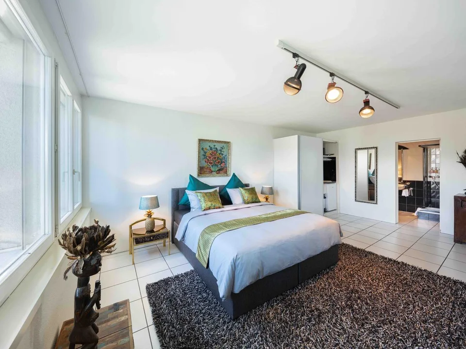 Exklusive Villa mit spektakulärer See- und Bergsicht – Foto 9 von 29