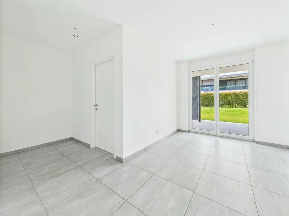 APPARTAMENTO 4.5 LOCALI CON GIARDINO