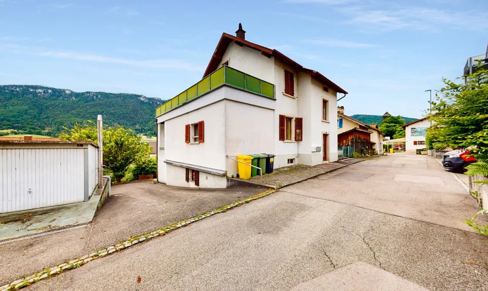 Immeuble de rendement | 13 garages | et Terrain constructible !