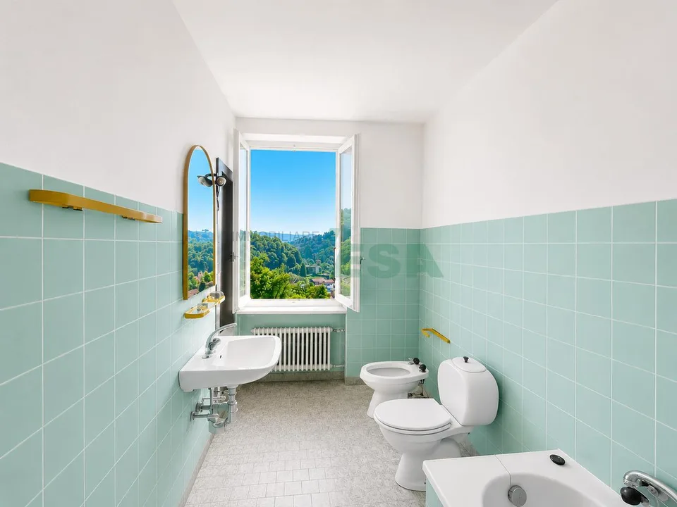 Ampia casa con 3 appartamenti di diverse dimensioni, con bella vista – Foto 12 von 15
