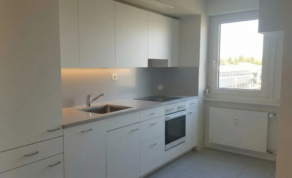 4-Zimmer-Wohnung mit Balkon und 2 Tiefgaragenplätzen an ruhiger Lage