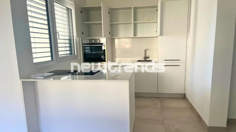 Viganello – Albonago: villetta a schiera con terrazza e vista aperta.