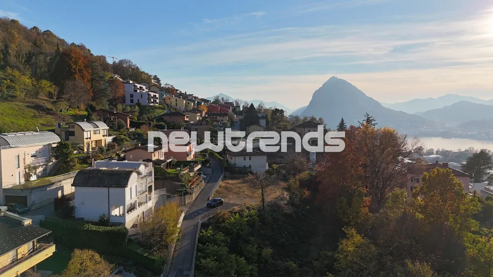 Viganello – Albonago: villetta a schiera con terrazza e vista aperta.