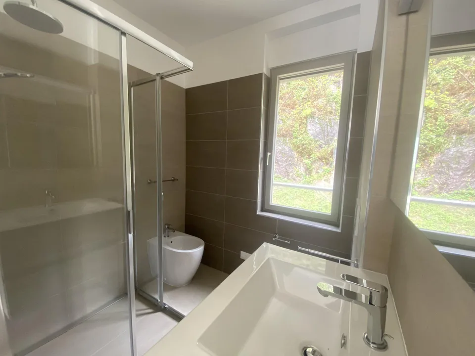 Carasso - Nuova Costruzione 2.5 locali con terrazza e vista aperta