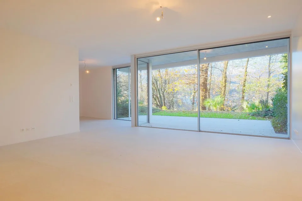 Prestigioso Triplex con Ascensore Privato e Giardino Esclusivo
