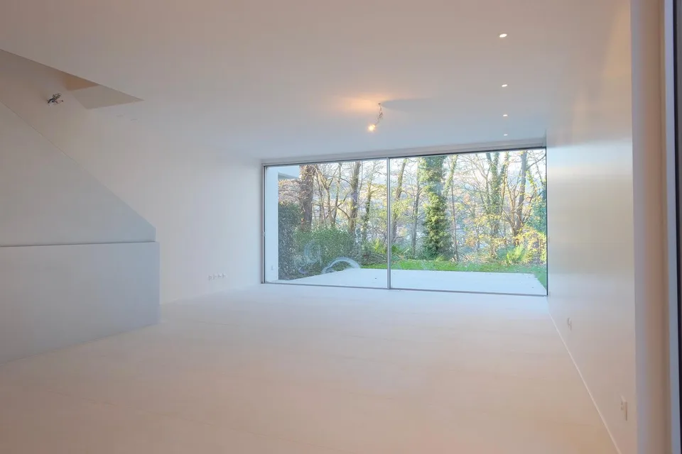 Prestigioso Triplex con Ascensore Privato e Giardino Esclusivo
