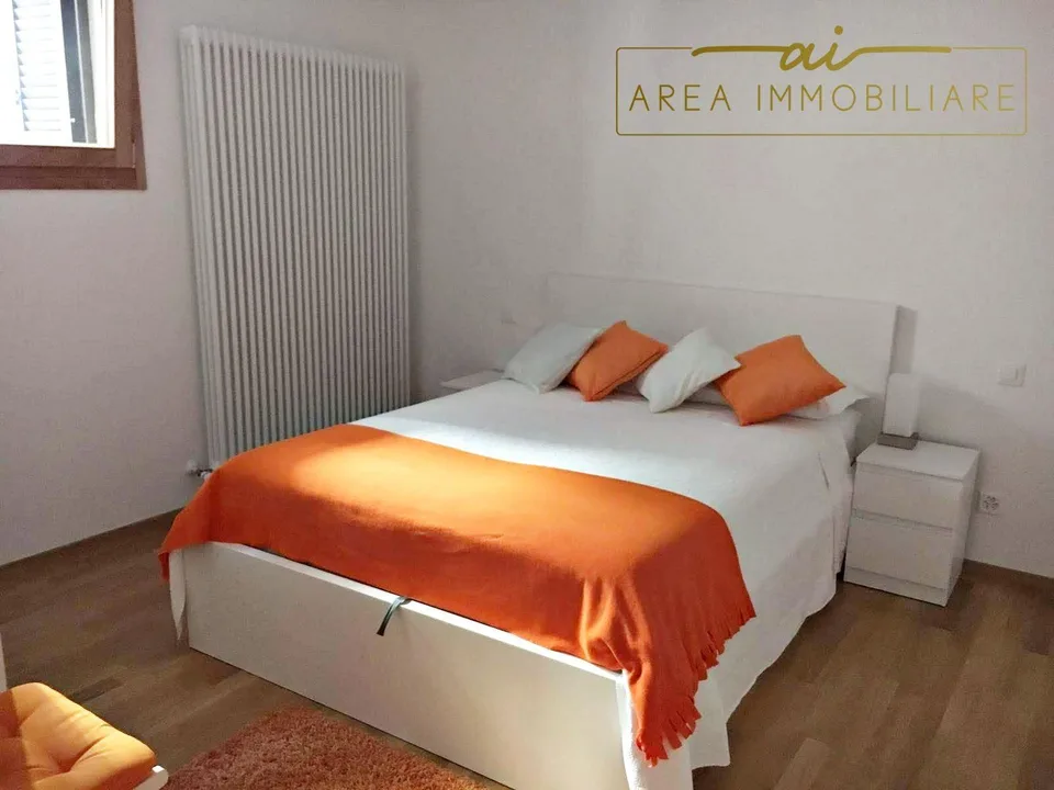 AMPIO E MODERNO 2.5 LOCALI CON CORTILE PRIVATO