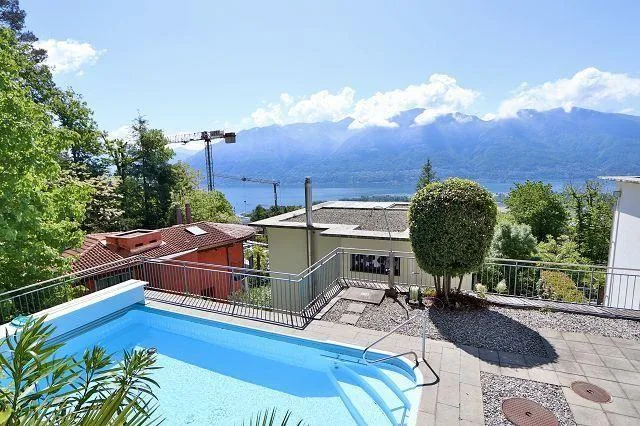 4 1/2-Zimmer-Luxuswohnung mit Terrasse und Garten mit Seeblick / ap... – Foto 28 von 29