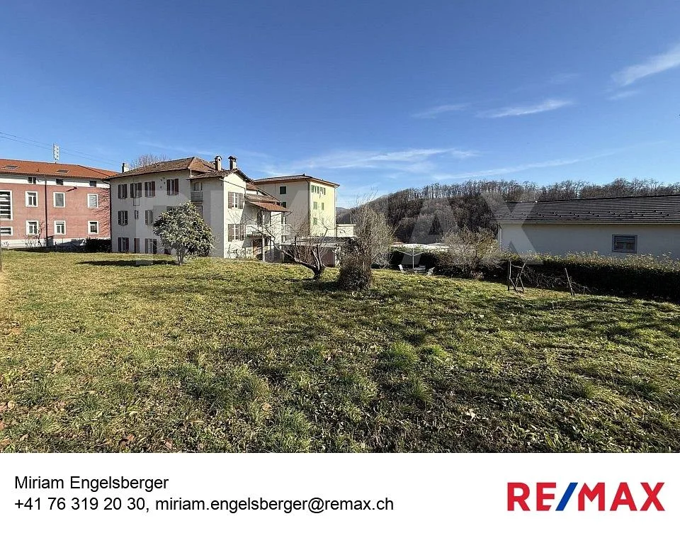 Edificio plurifamiliare con terreno edificabile