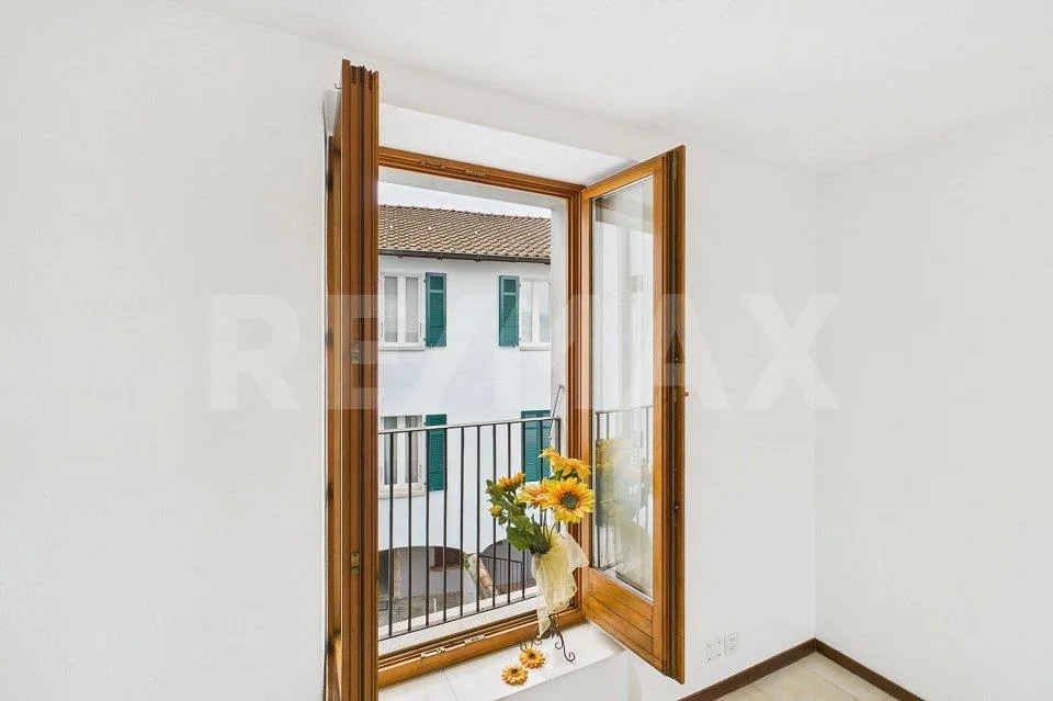 Residenza a reddito - 10 appartamenti, 1 negozio e grazioso cortile... – Foto 8 von 10