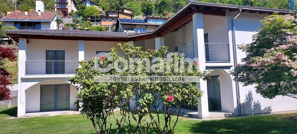 Casa bifamiliare con bel giardino – foto 10 di 10