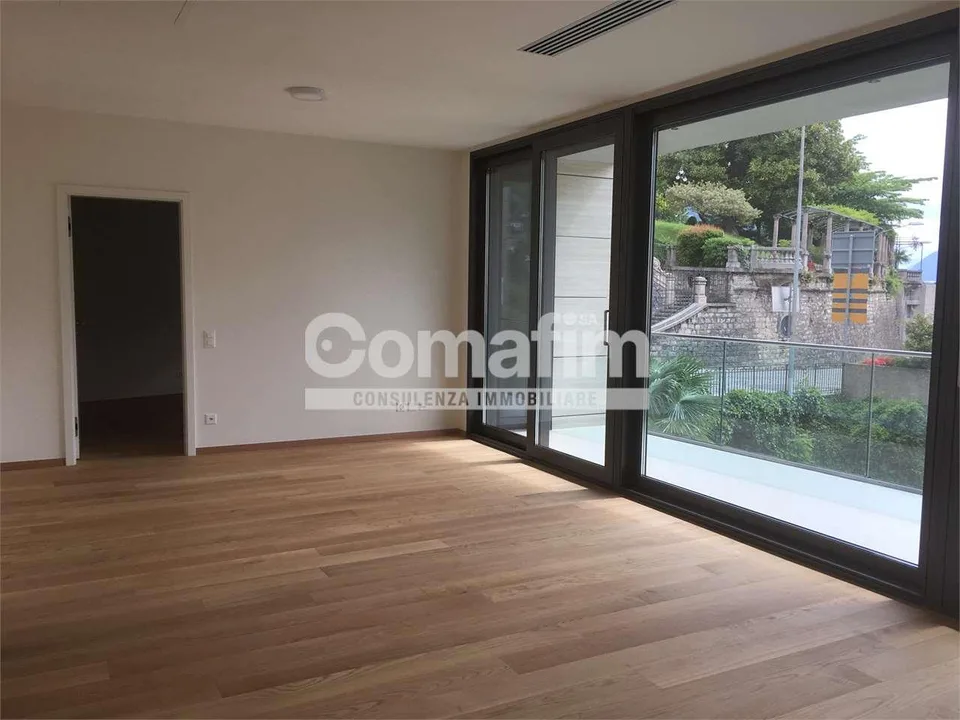Lugano, ampio appartamento 2 1/2 loc. con giardino