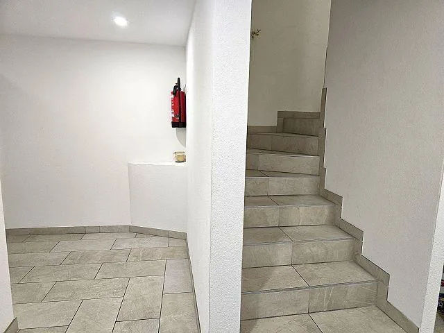 Mehrfamilienhaus mit drei 2 1/2-Zimmer-Wohnungen / Casa di 3 appart... – photo 12 sur 20
