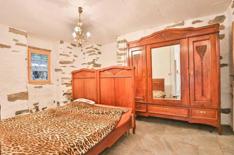 16-Zimmer-Tessinerhaus mit 4 Wohnungen mit Bauland und Aussicht / c... – Foto 18 von 21