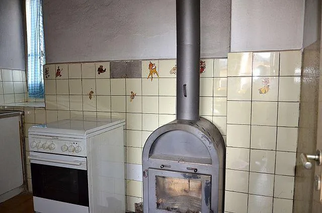 Mehrfamilienhaus mit Ausbaumöglichkeit und Garten/Casa plurifamilia...